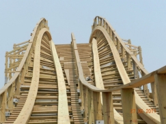 The Gravity Group has designed the High Five element for the racing wooden rollercoaster of Happy Valley Wuhan in China.