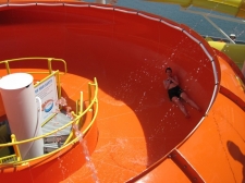 The Champagne Bowl is a SpaceBowl waterslide designed to fit on the deck of the ship