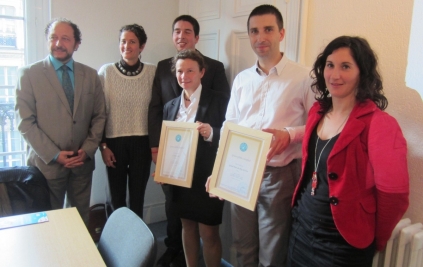 Representatives of SNELAC, Puy du Fou and FTC at with the two Green Globe certifications received in 2012 by Le PAL and Puy du Fou