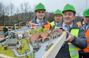 A part of the Fischer Family presents a model of Kracho during a press conference held early February.