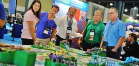 Rick Hunter of ProSlide Technology (pictured center) points out new attraction options.